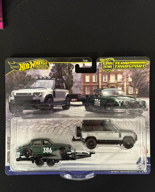 HOTWHEELS PREMIUM- TEAM TRANSPORT- 2023 LAND ROVER DEFENDER 130, JAGUAR MK1 (Imported)